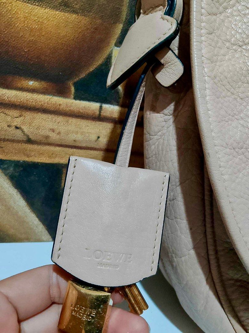 Leowe Madrid Shoulder Bag (Category: Luxury Bags & Wallets) located in Muntinlupa City. Submitted by phbudgetluxuryfinds (Listing ID 1328796096, Image 3). Description: Authentic Loewe Bag Shiny gold hardwares Clean interior .