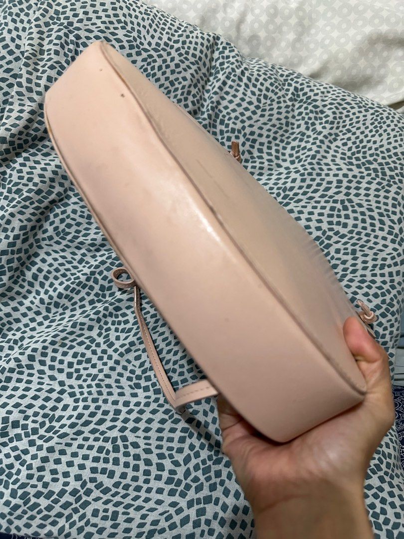 Mansur Gavriel Ocean Tote (Category: Luxury Bags & Wallets) located in Los Banos. Submitted by jeremiah31.3 (Listing ID 1328875970, Image 2). Description: In light peach color and still in very good used condition. Has some scratches and light stains but barely noticeable when worn. A bag with a minimalist yet stylish vibe. A statement bag indeed!.