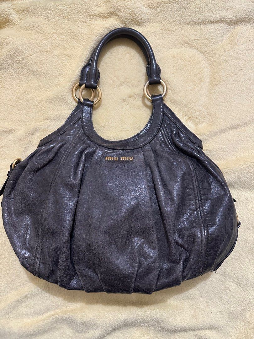 Miu Miu vitello sport bag (Category: Luxury Bags & Wallets) located in Los Banos. Submitted by jeremiah31.3 (Listing ID 1328903573, Image 1). Description: This bag is very sturdy and you can put a lot of stuff in it. It just Needs a bit of conditioning..