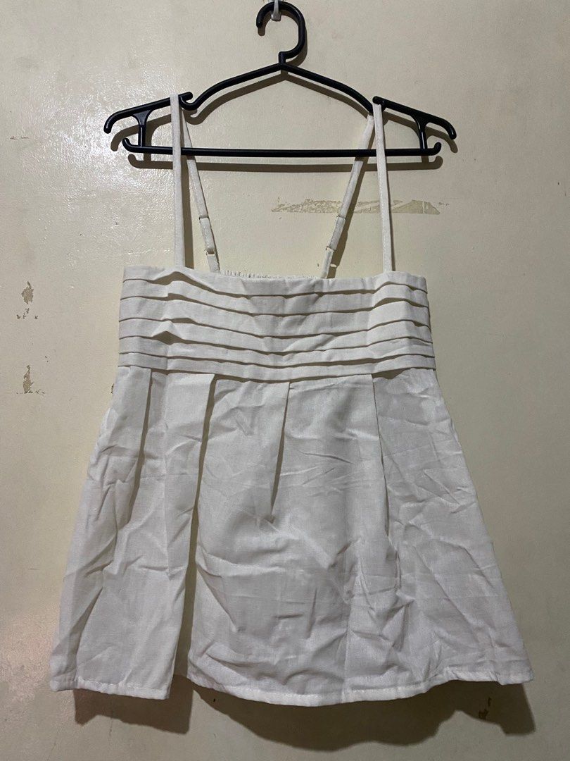 Peplum Top (Category: Sleeveless) located in Manila. Submitted by declutterwithmarga (Listing ID 1328864431, Image 1). Description: Never been used can fit from xs-s.