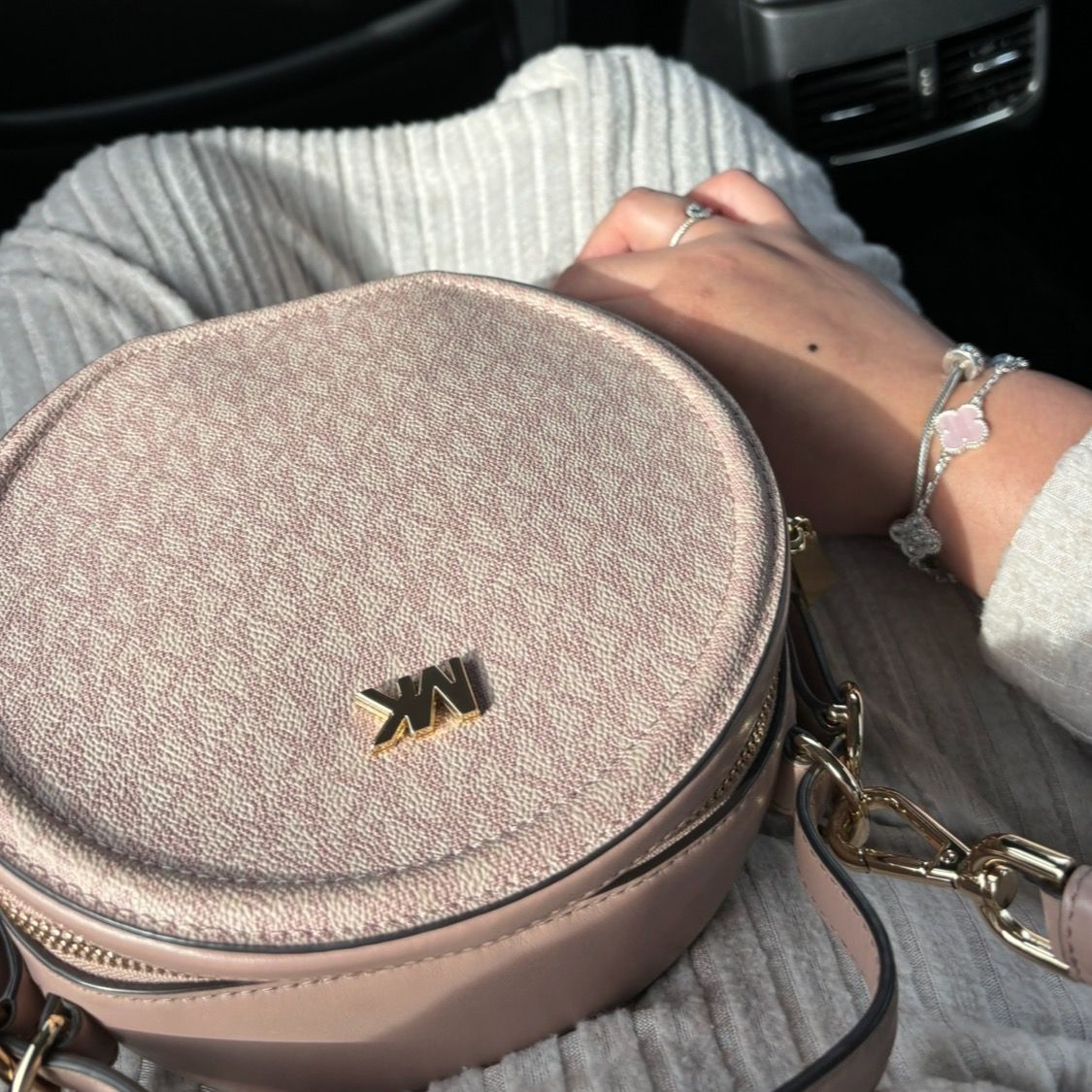 Mk round sling bag top