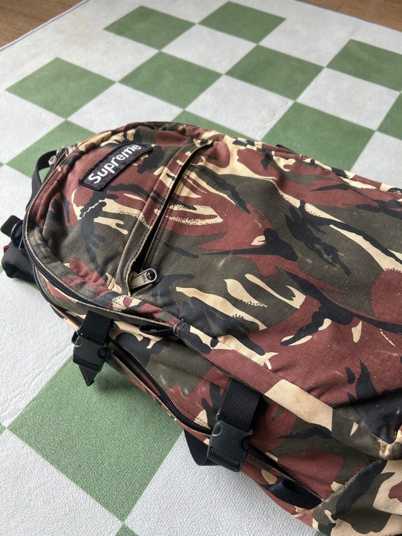 Supreme camo backpack store
