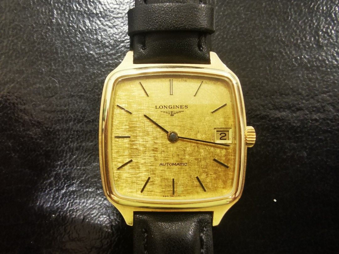 Vintage Longines Automatic Date (Category: Men's Watches) located in Makati City. Submitted by greatbuysmnl (Listing ID 1328828440, Image 1). Description: Rare Vintage Longines Automatic Date watch. Square Linen Gold Dial. With original signed crown and buckle. In excellent running condition..