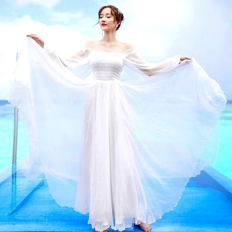 White chiffon dress (Category: Dresses) located in Quezon City. Submitted by aiceabe (Listing ID 1328780476, Image 2). Description: • Size: Large (can fit Medium to Large) • Bought this for 700 on Sh°pee • Only used once for fitting • Was planning to use this for civil wedding but had a change of plans.