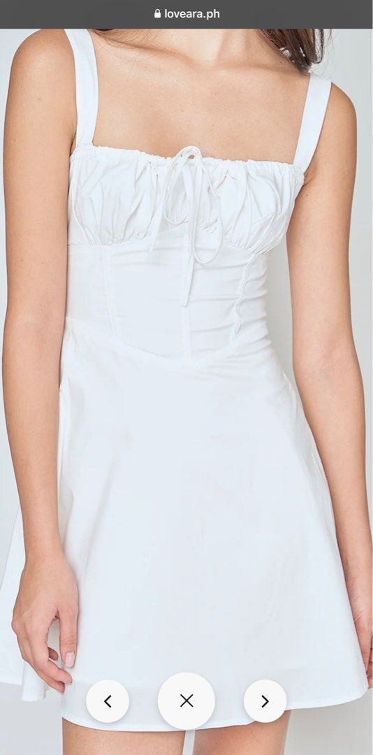 White dress from Love, Ara (Category: Dresses) located in Manila. Submitted by pdee11 (Listing ID 1328775293, Image 3). Description: Can’t fit my chest area. Still with tag Bought it at 990 .