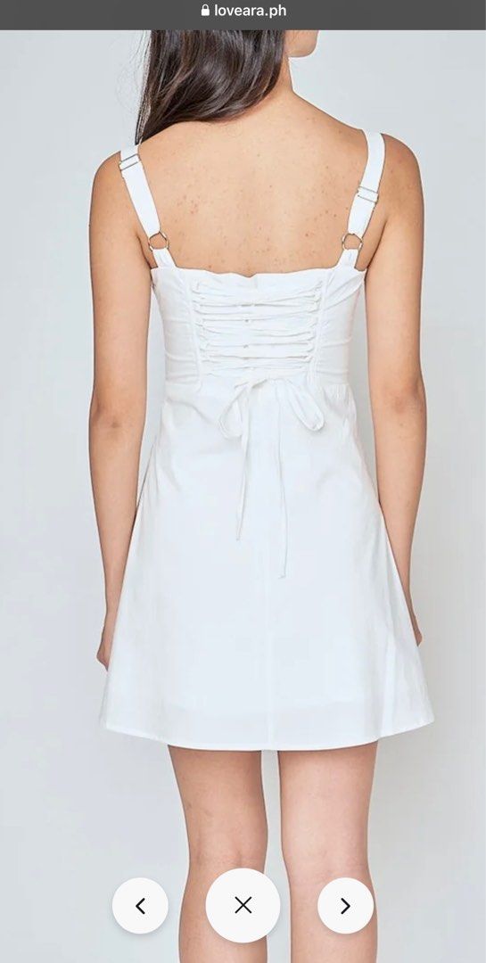 White dress from Love, Ara (Category: Dresses) located in Manila. Submitted by pdee11 (Listing ID 1328775293, Image 2). Description: Can’t fit my chest area. Still with tag Bought it at 990 .