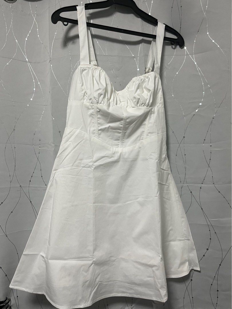 White dress from Love, Ara (Category: Dresses) located in Manila. Submitted by pdee11 (Listing ID 1328775293, Image 1). Description: Can’t fit my chest area. Still with tag Bought it at 990 .