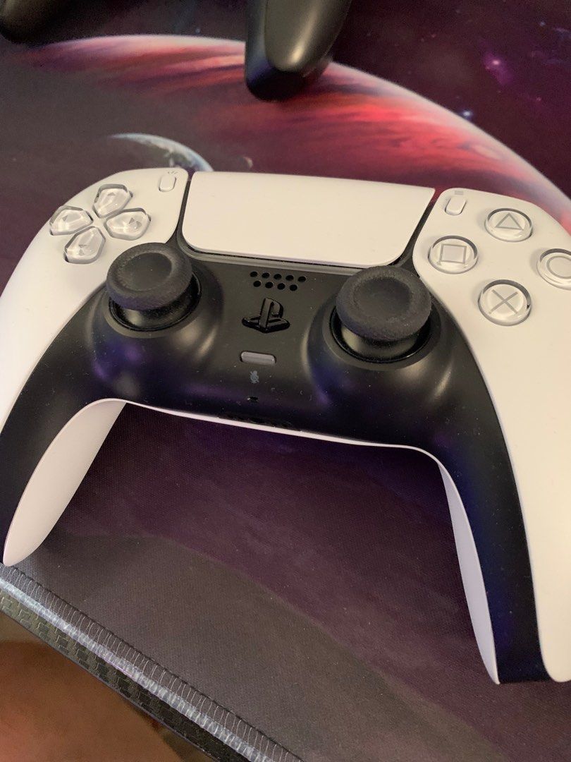White ps5 controller (Category: PlayStation) located in Pasig City. Submitted by akihiroishii23 (Listing ID 1328837099, Image 2). Description: Brand new ps5 console With box no issue .