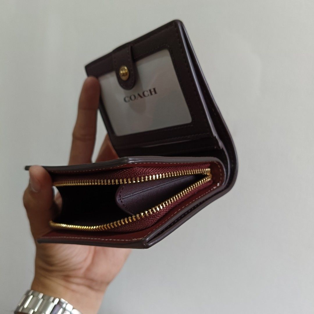 Coach Signature Monogram Print Snap Bifold Wallet CF522 (Category: Luxury Bags & Wallets) located in Manila. Submitted by clarklim (Listing ID 1333585232, Image 2). Description: Coach Signature Monogram Print Snap Bifold Wallet CF522 Teal Rogue Refined pebble leather Length: 4.25" Height: 3.25" Width: 1.0" Outside zip coin pocket Three credit card slots Snap closure Full-length bill compartment ID window 100% Authentic from the US. 🇺🇸 P 10,100.