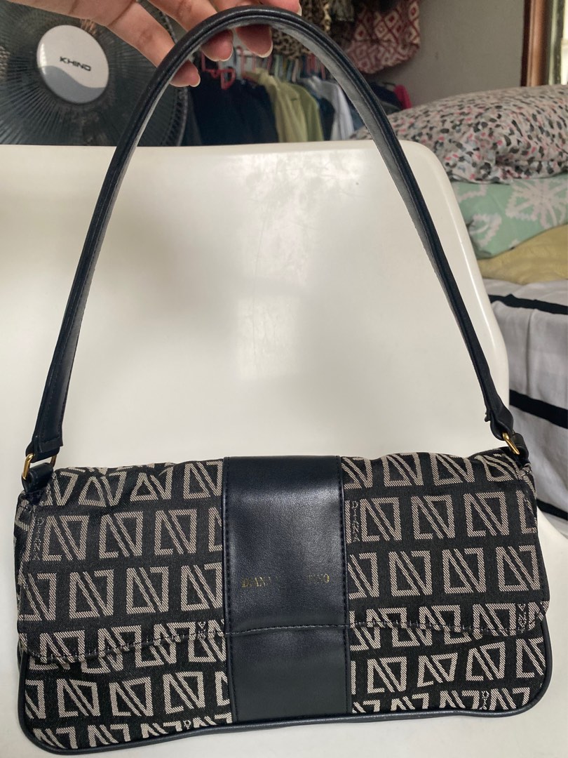 Diana valentino bag price hot sale
