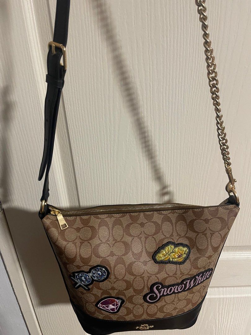 Disney x Coach Snow White Paxton Duffle Bag Women s Fashion Watches Accessories Other Accessories on Carousell
