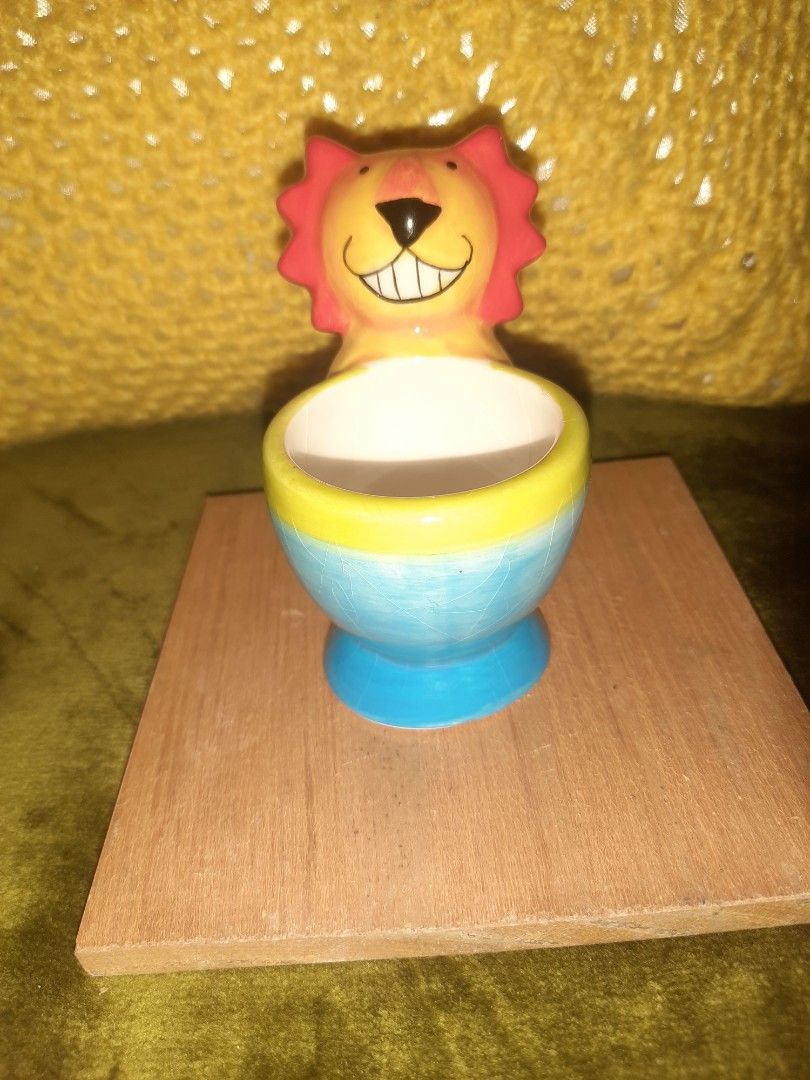 Egg cup animal shaped orange blue 3.5" (Category: Other Kitchenware & Tableware) located in Manila. Submitted by luckycharm_215 (Listing ID 1333546470, Image 1). Description: with chip as posted imported.