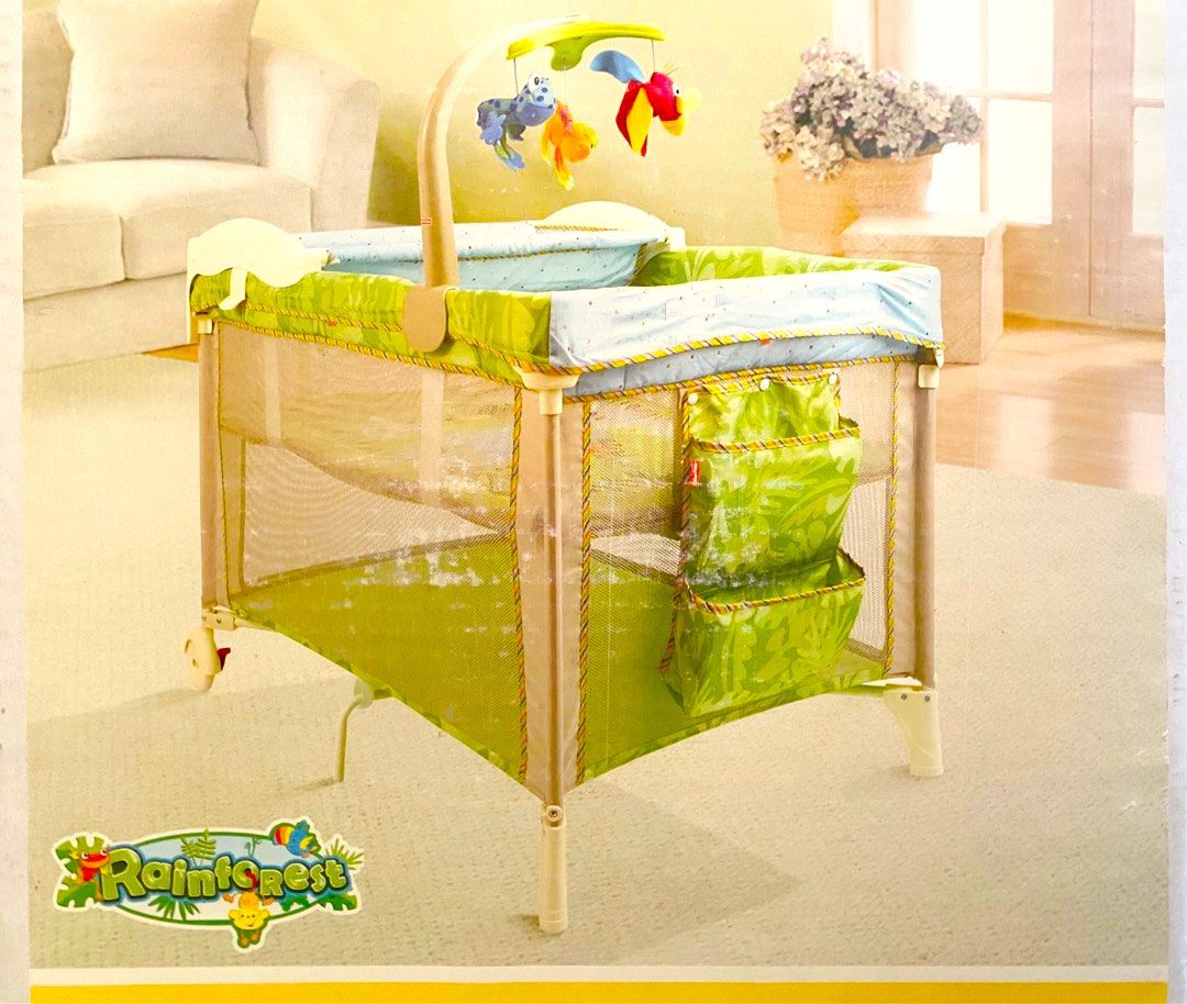 Fisher price rainforest portacot cheap