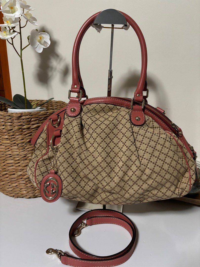 Gucci bag with sling (Category: Luxury Bags & Wallets) located in Paranaque City. Submitted by tanjnetluxurypreloved (Listing ID 1333601790, Image 1). Description: Original gucci with sling Cloth and leather material Small stain.