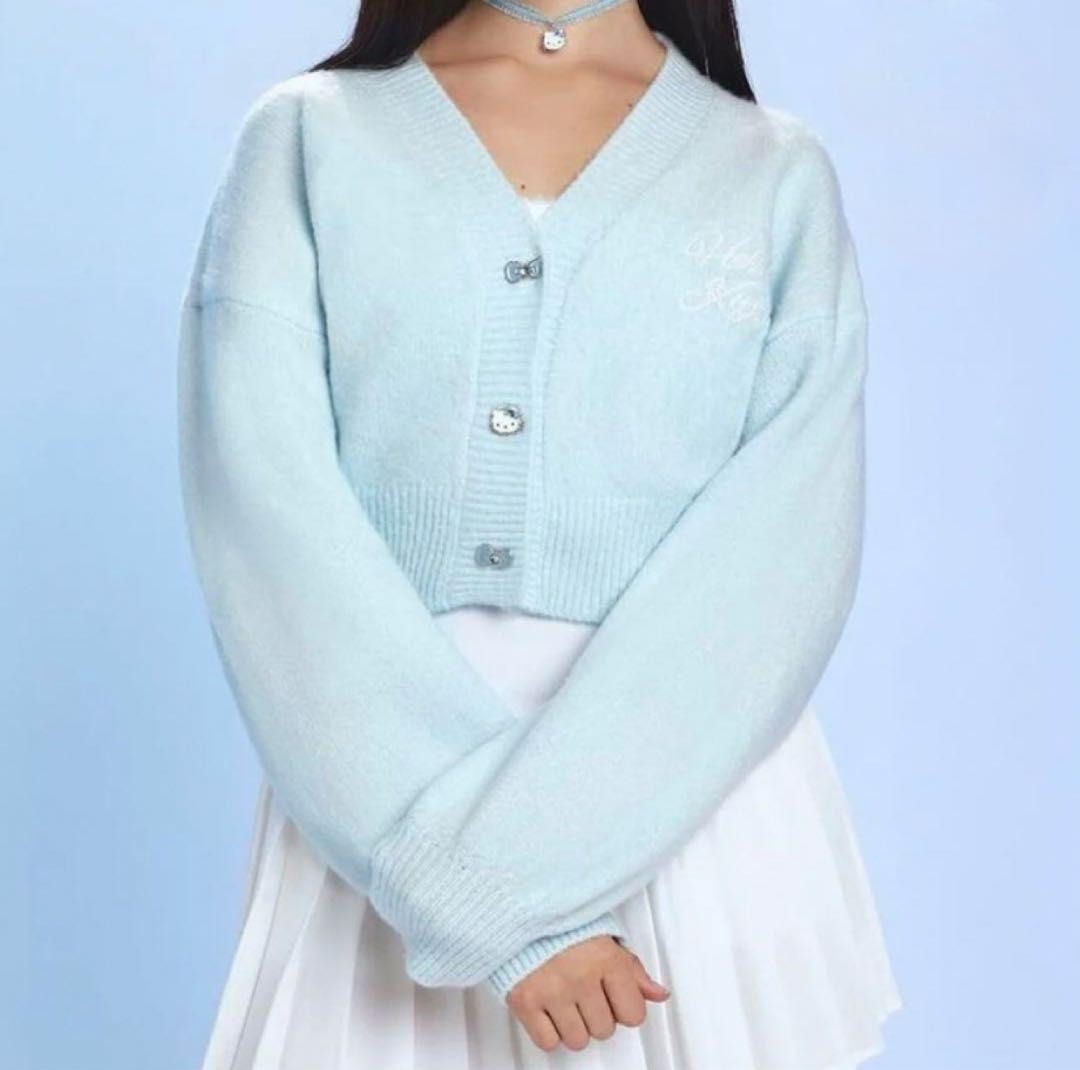 Hello Kitty Fuzzy Cardigan Sweater (Category: Coats, Jackets and Outerwear) located in Manila. Submitted by avenue.de.belle (Listing ID 1324924959, Image 1). Description: Hello Kitty Fuzzy Cardigan Sweater Brand New Onhand From Hello Kitty and Friends x Forever 21 collection, this fuzzy knit cardigan sweater features dropped long sleeves, front buttons with bow and Hello Kitty designs, ribbed trim, and a cropped hem. - © 2023 SANRIO CO., LTD. Use