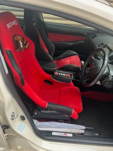 Honda Civic Type-R 2.0 (M) (Category: Used Cars) located in Singapore. Submitted by dannyng6775 (Listing ID 1333209006, Image 2). Description: Feature: Honda k20A Type R engine,6 speed manual transmittion, LSD,ABS,Climate aircon ,SRS, light weight chassis welded chassis. Accessories: Toda Racing exhaust with certificate, Original Advan racing sport rims, original Mugen front grille from Japan, new tyres (Install on Oct 2024), Defi gauge and HKS C