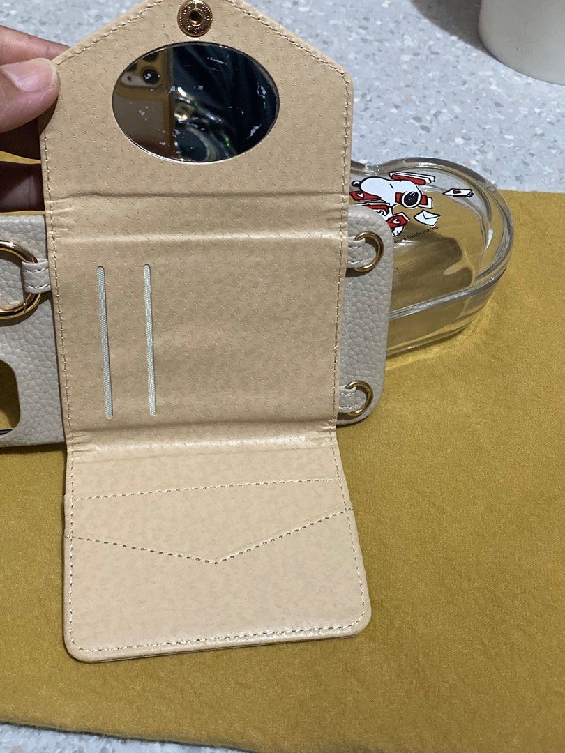 iPhone 14 Plus case with card holder and mirror (Category: Cases & Sleeves) located in Caloocan City. Submitted by sheng5207418 (Listing ID 1333521504, Image 3). Description: This case is new but been stock as you can see the mirror have some scratches but over all its nice. .