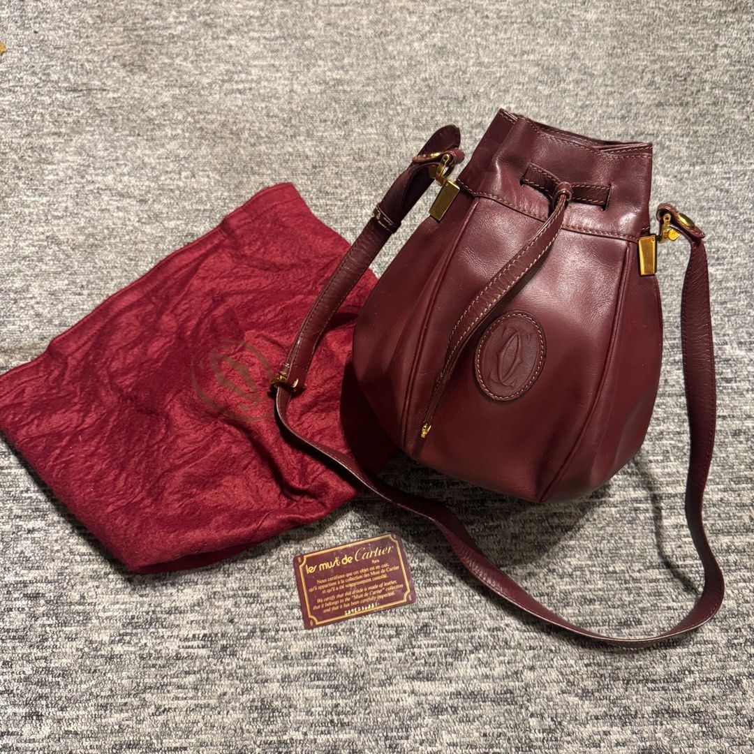 MOVE OUT SALE CARTIER Must Line Mini Drawstring Leather Crossbody Bag Luxury Bags Wallets on Carousell