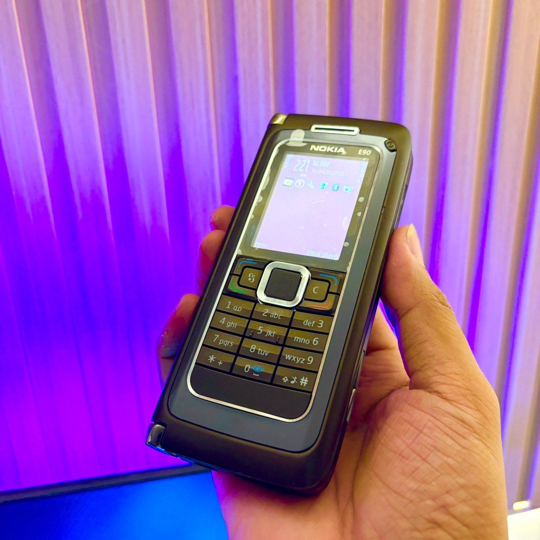 Nokia E90 for Globe and TM SIM Only (Category: Early Generation Mobile Phones) located in Lipa City. Submitted by slicksmithtechnology (Listing ID 1333518203, Image 2). Description: Working and no issue. From Globe and will only work with GLOBE, TM, and GOMO SIM card. The phone comes with new battery, charger, sim card adapter, polishing cloth (microfiber)..