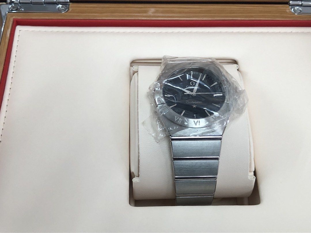OMEGA Constellation 36mm Black Dial Men's Watch (Category: Luxury Watches) located in Manila. Submitted by luxemax_09 (Listing ID 1333609522, Image 2). Description: Gender: Men’s Reference #: 13110366001001 Year Model: 2020 Movement: Quartz Case Size: 36mm Case Material: Stainless Steel Strap Size: 7.25” / 9” (with face) Crystal: Sapphire Water Resistance: 30m Dial Type/Color: Analog/Black Calendar: Date Display Band Type: Bracelet Band Material: