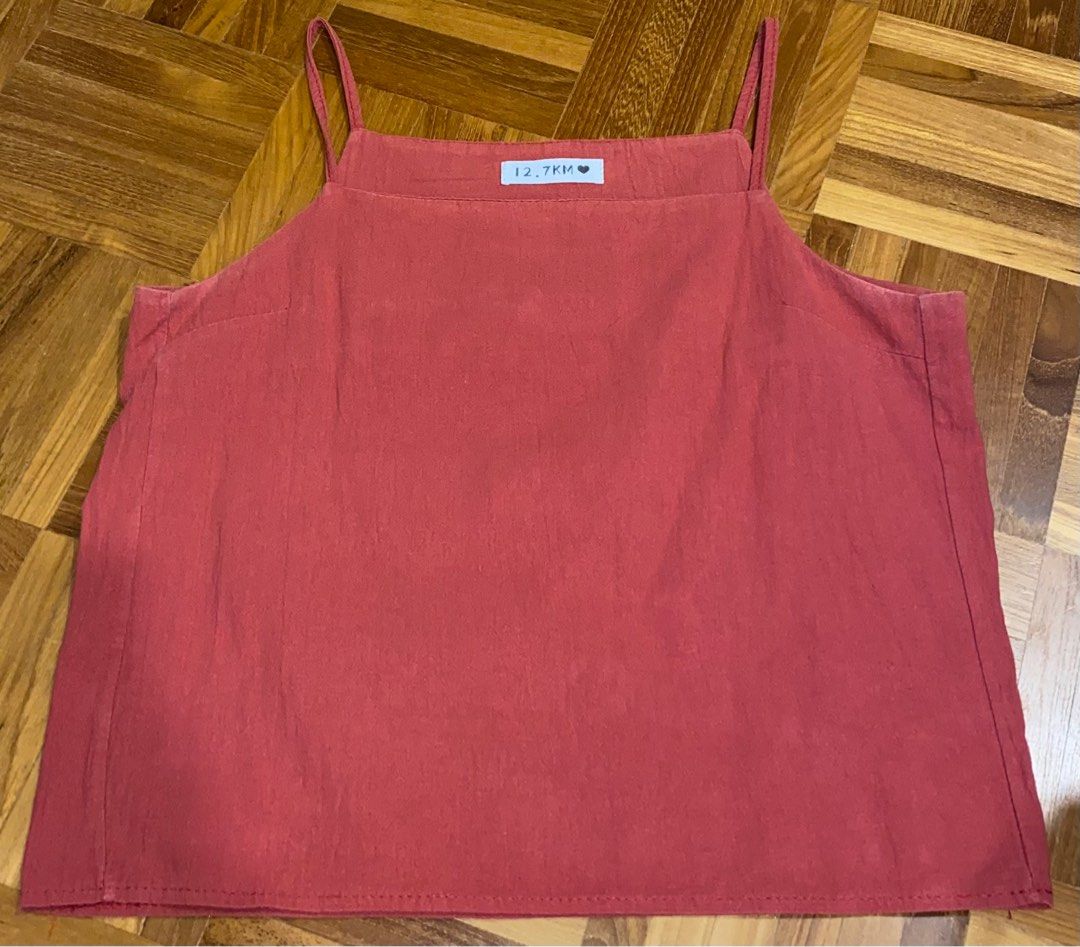 Red spaghetti strap top (Category: Sleeveless) located in Singapore. Submitted by lilysellsclothes (Listing ID 1333658874, Image 1). Description: .