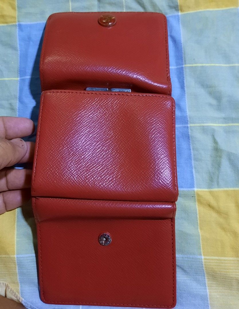 AGNES B. Small trifold wallet (Category: Luxury Bags & Wallets) located in Manila. Submitted by smicolen (Listing ID 1333800361, Image 3). Description: AGNES B. small trifold wallet issues: mejo madumi sa may lagayan paper bills and may konti sira sa coins slot re-painted.