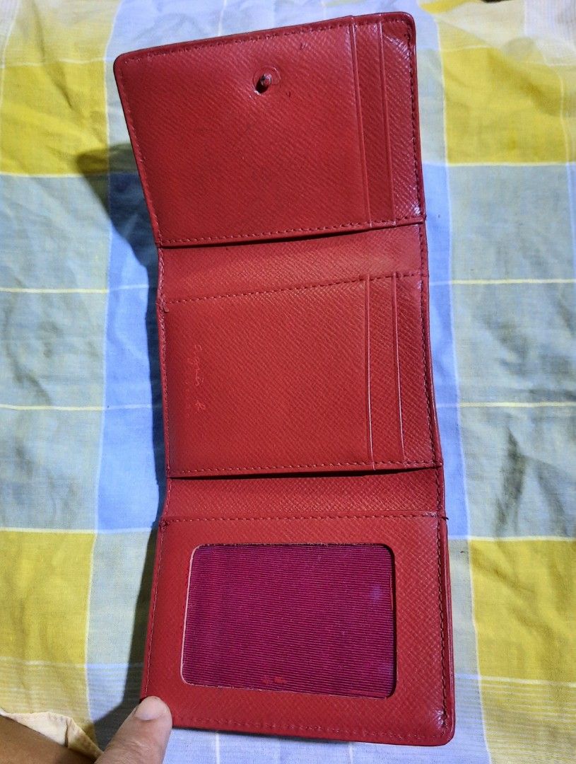 AGNES B. Small trifold wallet (Category: Luxury Bags & Wallets) located in Manila. Submitted by smicolen (Listing ID 1333800361, Image 2). Description: AGNES B. small trifold wallet issues: mejo madumi sa may lagayan paper bills and may konti sira sa coins slot re-painted.
