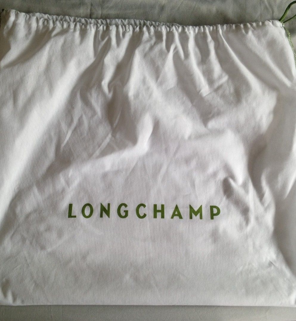 Brand New Long Champ big leather bag (Category: Luxury Bags & Wallets) located in Quezon City. Submitted by auibee (Listing ID 1333746749, Image 3). Description: selling this brand new leather bag from Longchamp; comes with dustbag.