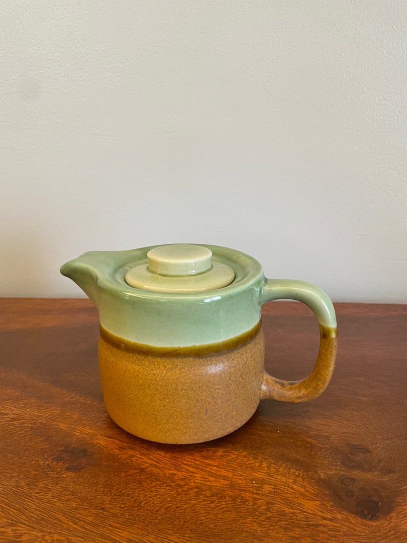 Green and Brown Ceramic Tea Pot (Category: Pitchers & Dispensers) located in Muntinlupa City. Submitted by a.declutterer (Listing ID 1333690533, Image 1). Description: Still in good condition except for small chip inside tea pot lid (see picture) RFS: Decluttering .
