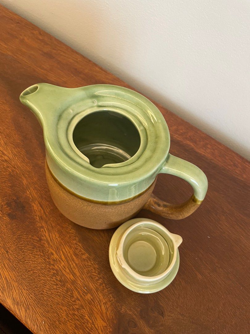 Green and Brown Ceramic Tea Pot (Category: Pitchers & Dispensers) located in Muntinlupa City. Submitted by a.declutterer (Listing ID 1333690533, Image 2). Description: Still in good condition except for small chip inside tea pot lid (see picture) RFS: Decluttering .