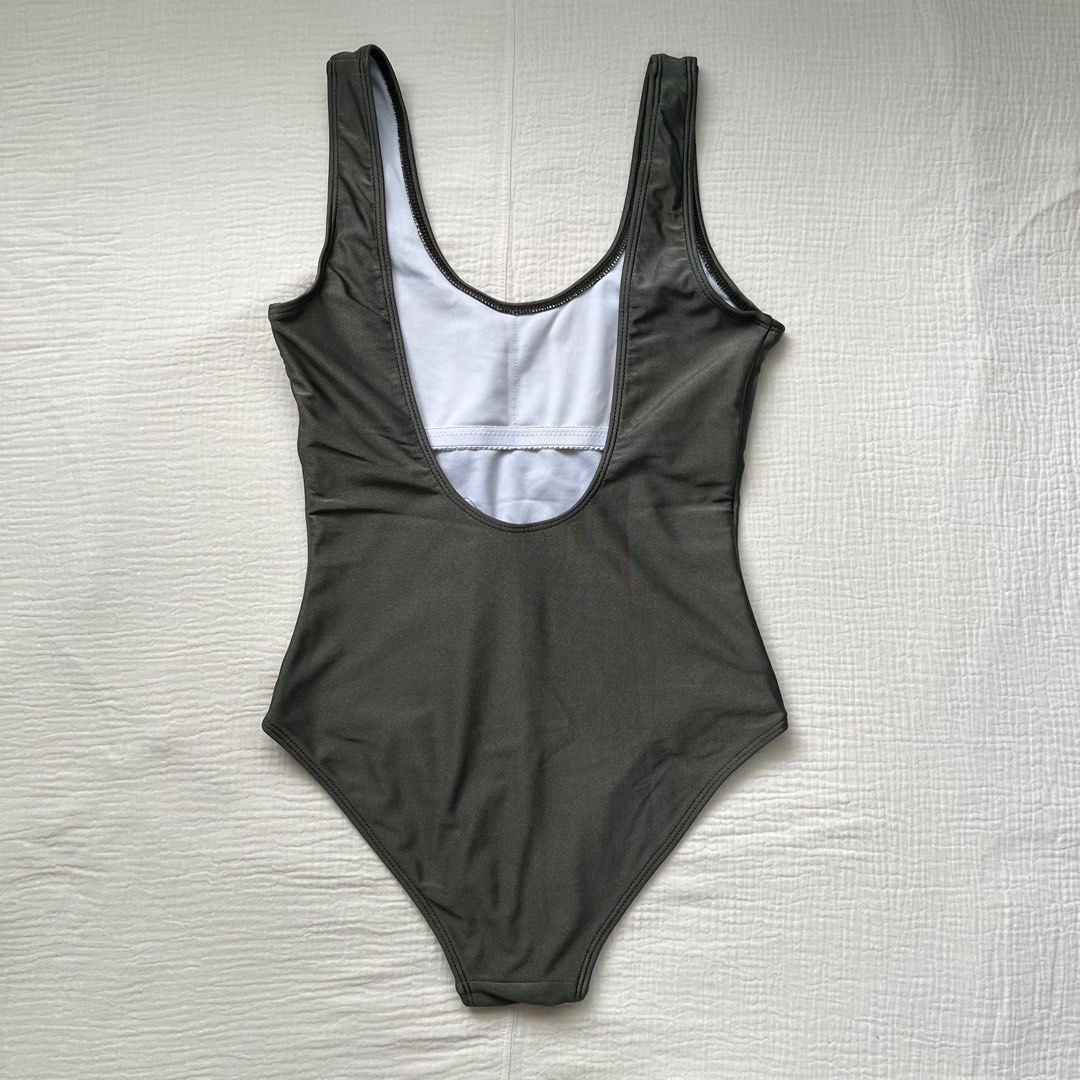 Georginasasha One Piece Swimsuit (Category: Bikinis & Swimsuits) located in Las Pinas. Submitted by fullyclothed (Listing ID 1333702728, Image 2). Description: READ BEFORE YOU OFFER 🙂 Georginasasha One Piece Swimsuit Lightly used Moss green With padding (not shown in pictures) Size XS Selling price: 300 Owner’s measurements: Bust - 31-32 A Waist - 25 Hip - 34 Torso - 56-57 CHECK YOUR MEASUREMENTS BEFORE BUYING. ♥️ SELLER IS NOT LIABLE IF THE GAR