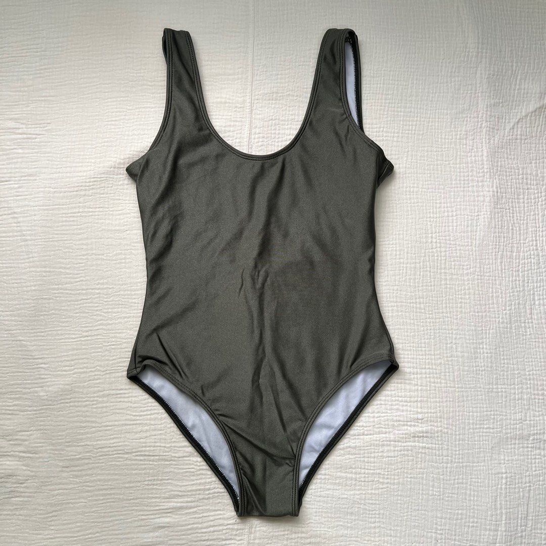 Georginasasha One Piece Swimsuit (Category: Bikinis & Swimsuits) located in Las Pinas. Submitted by fullyclothed (Listing ID 1333702728, Image 1). Description: READ BEFORE YOU OFFER 🙂 Georginasasha One Piece Swimsuit Lightly used Moss green With padding (not shown in pictures) Size XS Selling price: 300 Owner’s measurements: Bust - 31-32 A Waist - 25 Hip - 34 Torso - 56-57 CHECK YOUR MEASUREMENTS BEFORE BUYING. ♥️ SELLER IS NOT LIABLE IF THE GAR