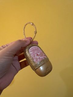 Hand sanitizer holder