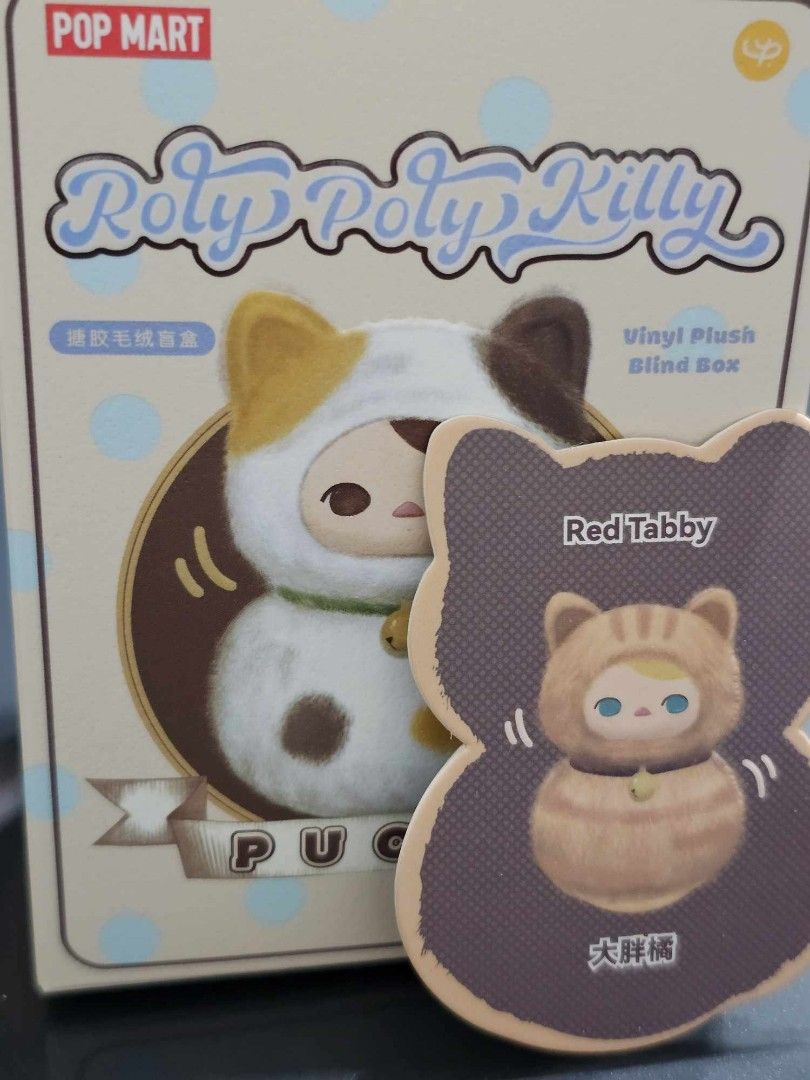 Popmart Roly Poly Kitty Red tabby (Category: Designer & Blind Box Toys) located in Pasay City. Submitted by jd.mktg (Listing ID 1333818841, Image 1). Description: Sealed foil Open bottom box only.