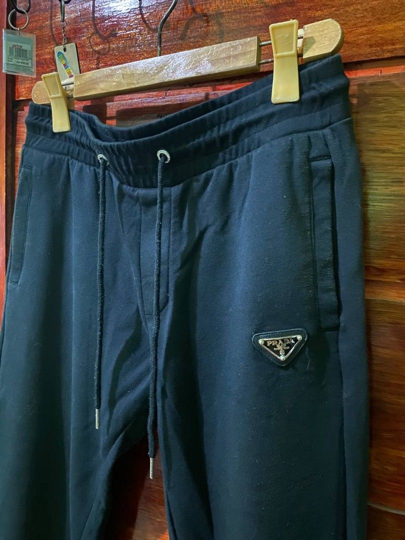 Prada Emblem Logo Jogger Pants Men s Fashion Bottoms Joggers on Carousell