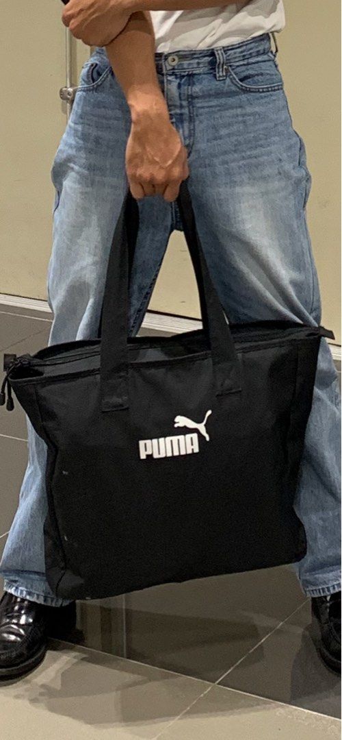 Puma Classic Tote Bag (Category: Tote Bags) located in Makati City. Submitted by superjaa (Listing ID 1333736776, Image 3). Description: Condition 10/10 Can used as a gym bag or travel bag Dm for more photos 📩.
