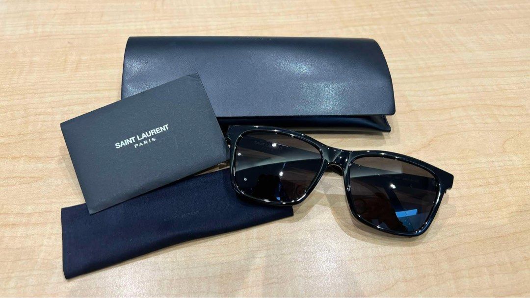 Saint Laurent Sunglasses (Category: Sunglasses & Eyewear) located in Manila. Submitted by quaaaint (Listing ID 1333819554, Image 1). Description: Used Once Complete with Case and Wiper DM for WW Photos Loc: Sampaloc, Manila.