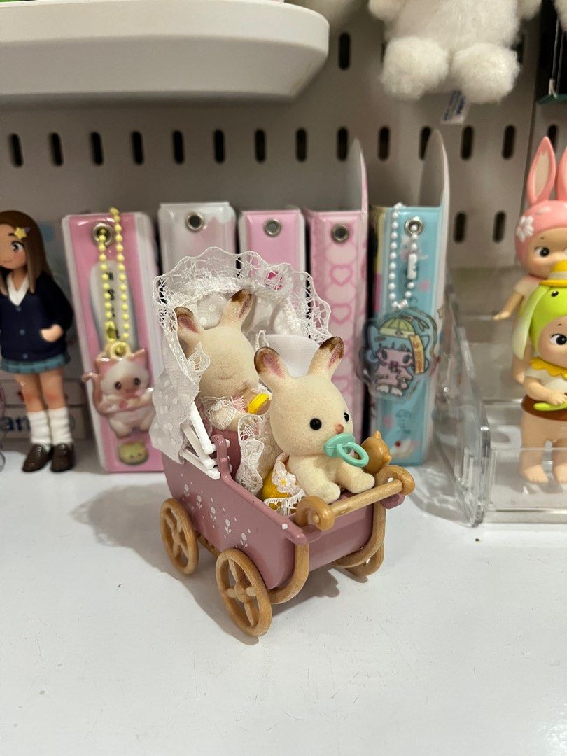 Sylvanian Families Chocolate Rabbit Twins (Category: Figurines & Statues) located in Manila. Submitted by strwberrykori (Listing ID 1333681154, Image 1). Description: - complete with box - bought from mercari jp - so cute for display! 🐰🍼.
