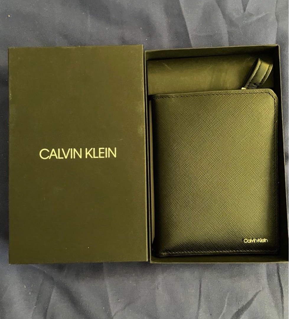 Calvin Klein passport holder Men s Fashion Watches Accessories Wallets Card Holders on Carousell
