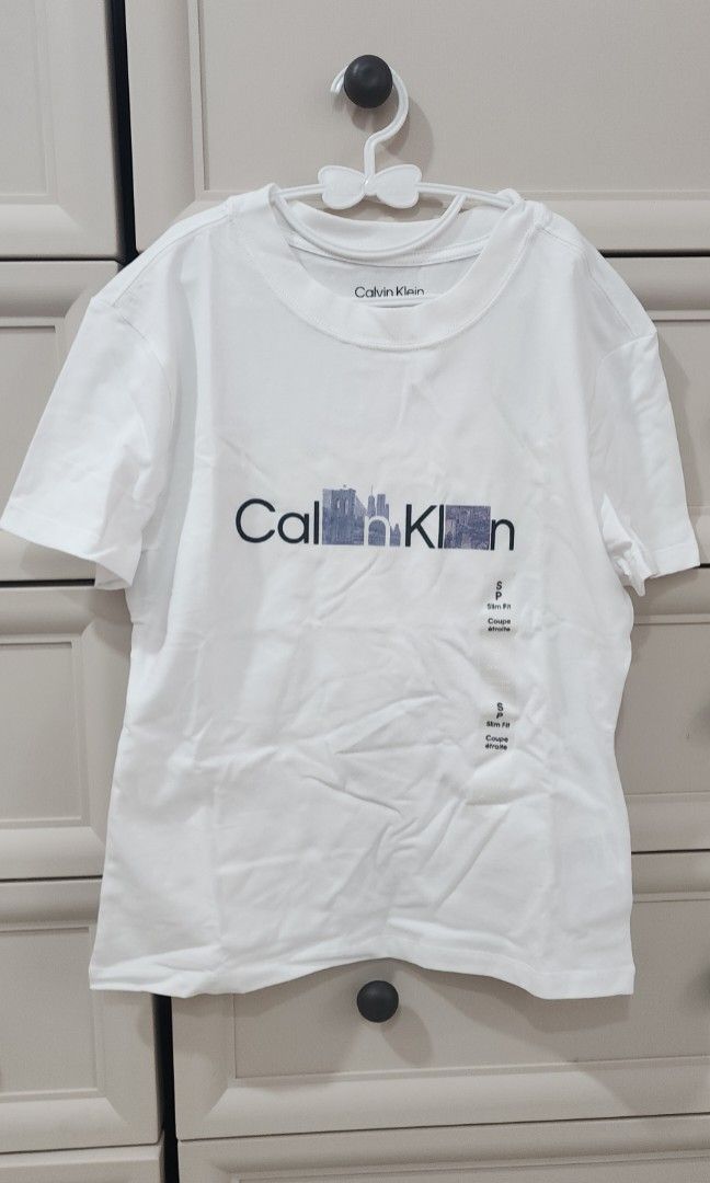 Calvin Klein Slim Fit (Category: Shirts) located in Manila. Submitted by gingerific (Listing ID 1328986672, Image 1). Description: brand new from canada.