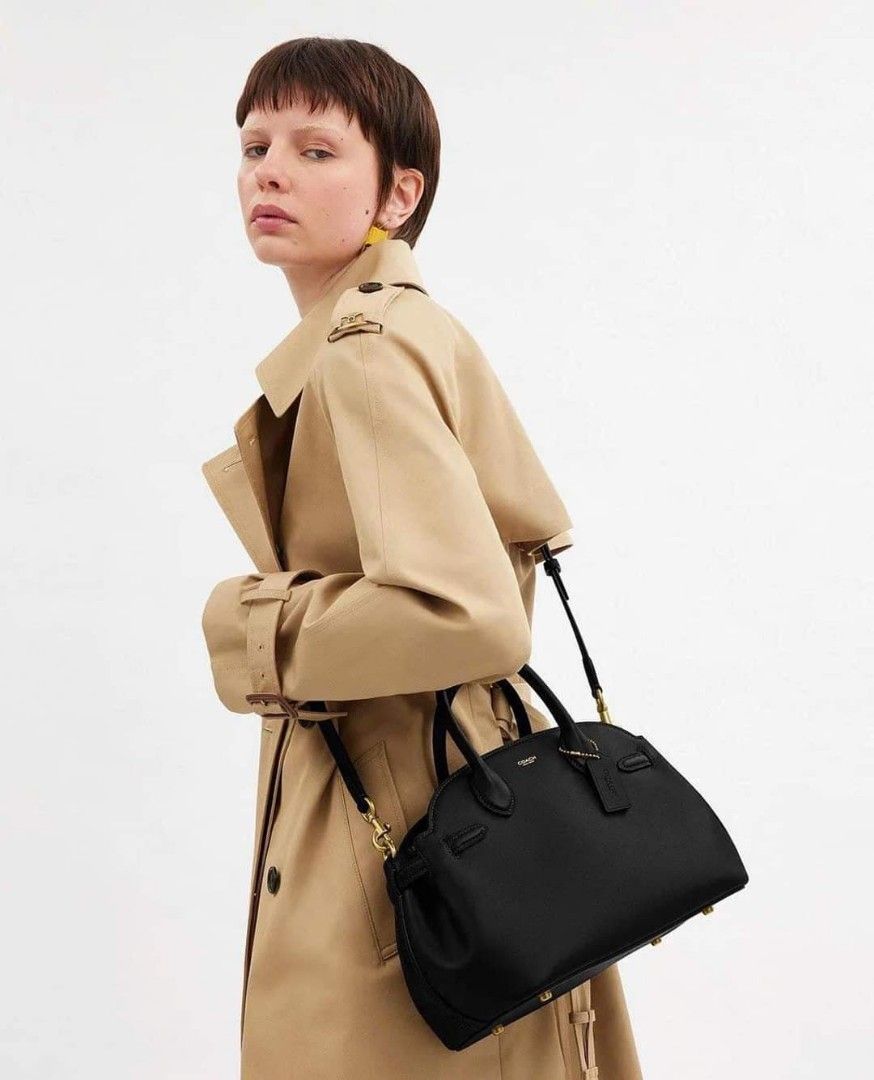 Coach Empire Carryall Bag 28 Black (Category: Tote Bags) located in Manila. Submitted by stacey_lopez922 (Listing ID 1328989542, Image 1). Description: Coach Empire Carryall Bag 28 Black (With dustbag and paperbag) - 35.5cm (L) x 21.5cm (H) x 16cm (W) - Glovetanned leather - Inside snap pocket - Center zip compartment - Fabric lining - Handles with 9.5cm drop - Detachable strap with 54.5cm drop for shoulder or crossbody wear - Four protective fee