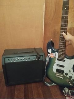 Electric Guitar w/ amplifier and accessories
