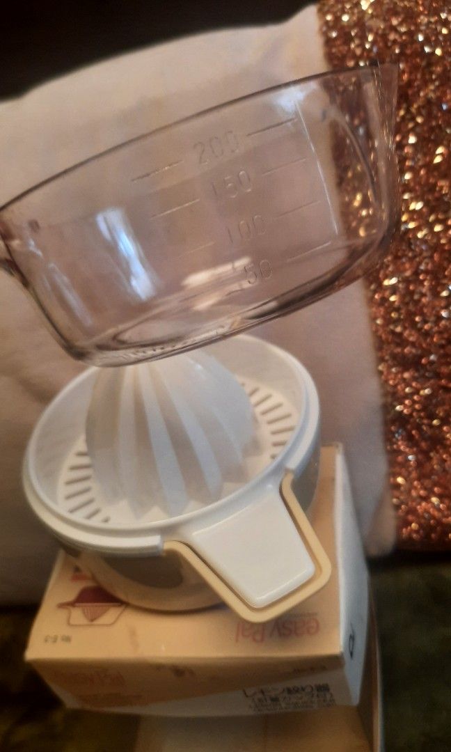 Lemon squeezer with measuring cup 4x5" Made in Japan (Category: Other Kitchenware & Tableware) located in Manila. Submitted by luckycharm_215 (Listing ID 1328967542, Image 2). Description: New with box.
