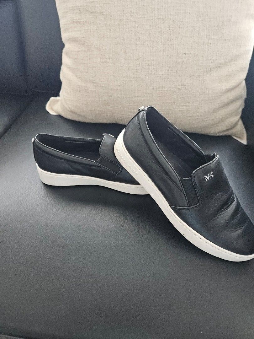 Michael Kors (Category: Shoes) located in North York. Submitted by marisa4 (Listing ID 1329083712, Image 1). Description: Great condition. Slightly used Michaels Kors slip ons. Size 6. Genuine Leather..