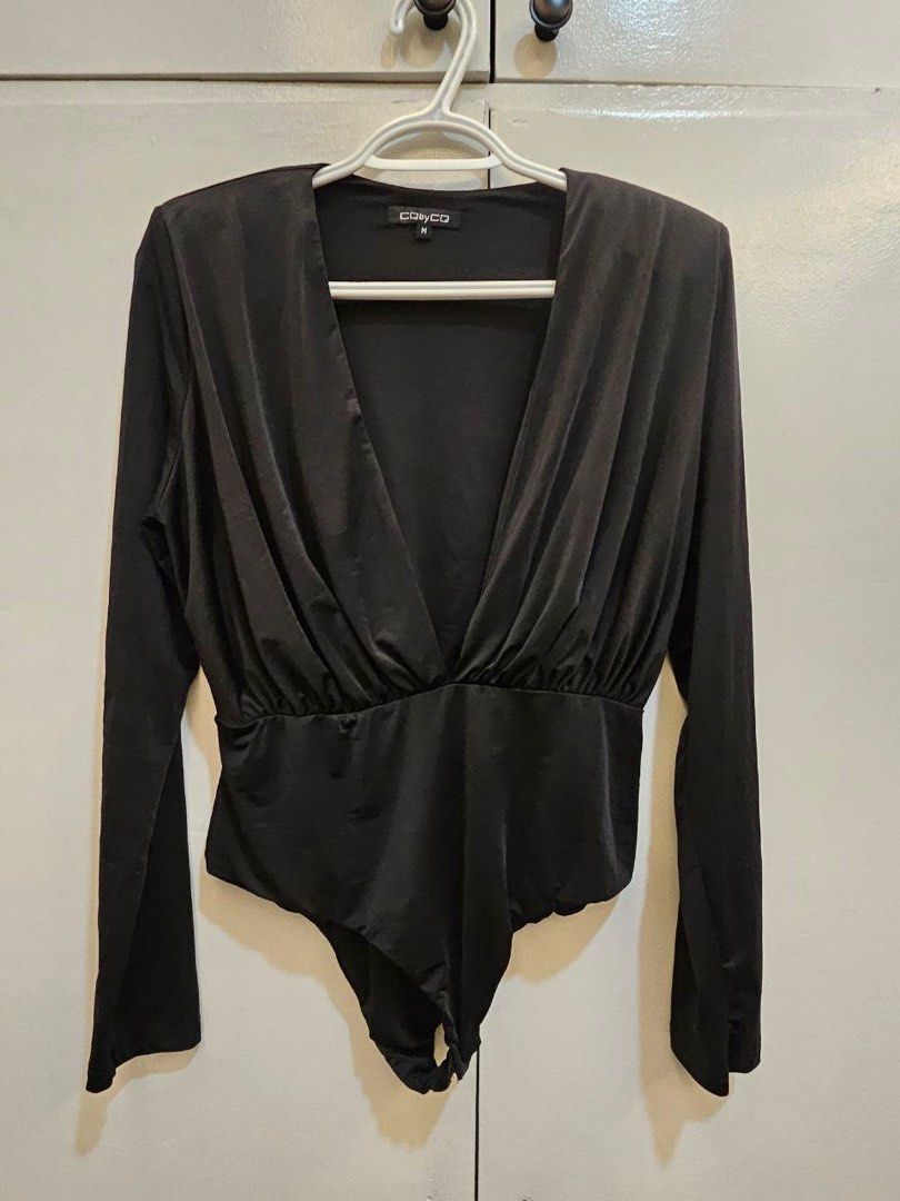 Onesie Top (Category: Others Tops) located in Quezon City. Submitted by hollyarevalo (Listing ID 1329086014, Image 3). Description: These are my preloved items in really good condition. Some of these clothes are still brand new with tags or unused or maybe used once or twice max unless I mention any flaw it should be really good!!! Prices are still negotiable so just message me. Brand: CQ by CQ Size: Medium Color: Black RFS: Too small for me / ch
