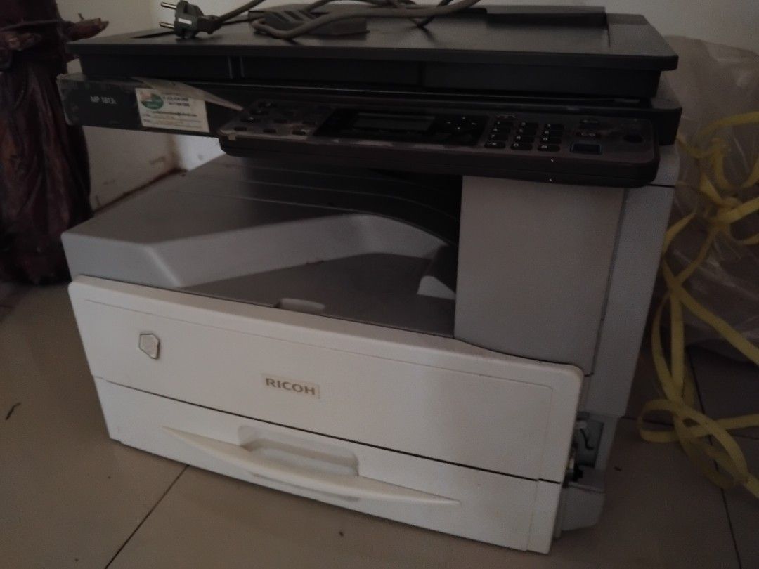 Ricoh (Category: Printers, Scanners & Copiers) located in San Fernando. Submitted by imlikeabird (Listing ID 1329048184, Image 3). Description: ricoh Xerox machine well used, need maintenance. need to declut for space usage..