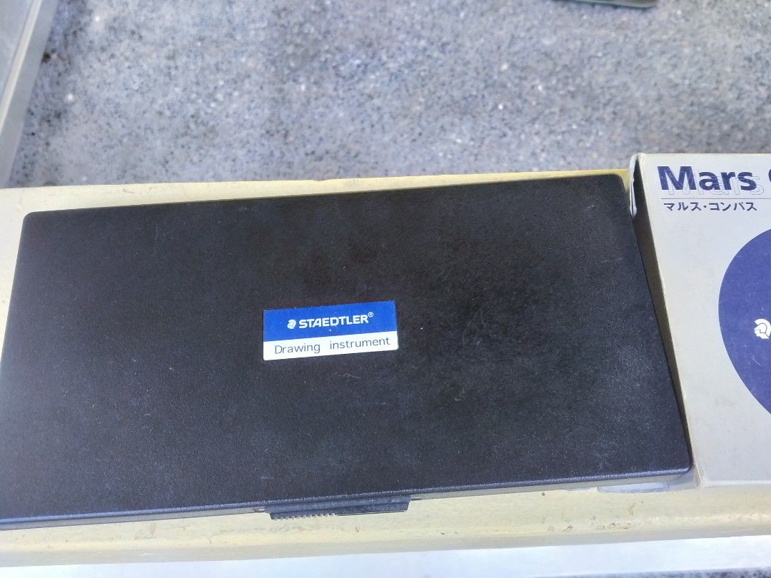 Staedtler made in Germany Compass Drafting kit (Category: Stationery & School Supplies) located in Muntinlupa City. Submitted by prime_finder (Listing ID 1329007679, Image 1). Description: Staedtler made in Germany Compass Drafting kit wysiwyg 1,900 Lahat na yan.