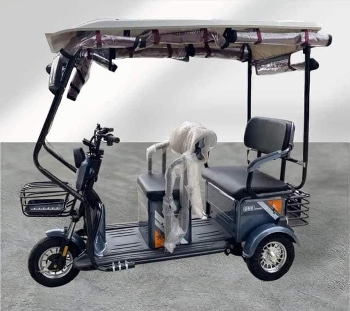 super fashion ebike 3wheels (Category: Bicycles) located in Manila. Submitted by saguittarian06 (Listing ID 1328985866, Image 3). Description: NEW ARRIVAL Super FASHION ebike 10 inches tire 3 wheels,2 rows with ROOF! INCLUSIONS: Unit with complete accessories Side mirror with trapal automatic wiper Specs. With wiper With panel With anti theft alarm 3 seater Front & Back Basket Battery Lead Acid 48v 20AH 650Watts 40-50Km Range 40-60Km/H Speed 350k