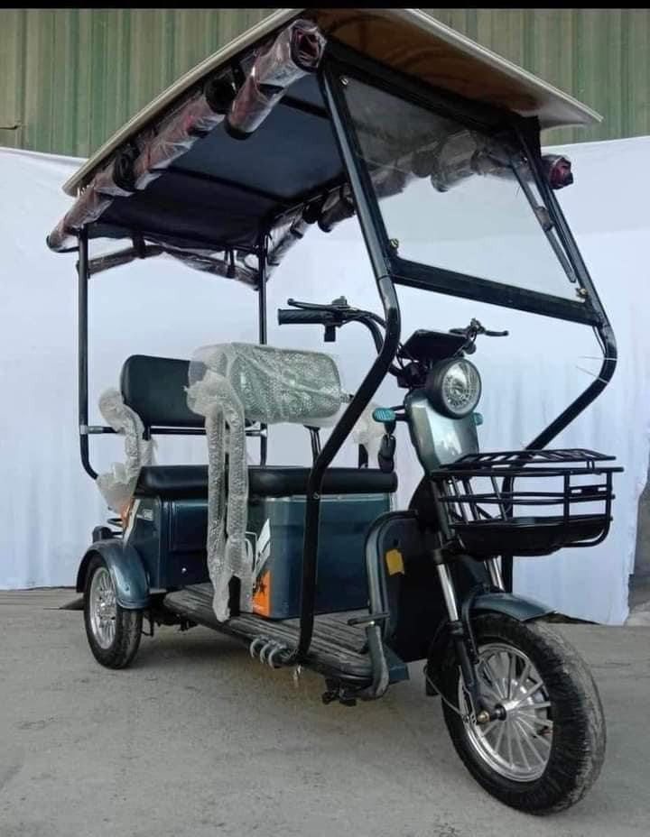 super fashion ebike 3wheels (Category: Bicycles) located in Manila. Submitted by saguittarian06 (Listing ID 1328985866, Image 1). Description: NEW ARRIVAL Super FASHION ebike 10 inches tire 3 wheels,2 rows with ROOF! INCLUSIONS: Unit with complete accessories Side mirror with trapal automatic wiper Specs. With wiper With panel With anti theft alarm 3 seater Front & Back Basket Battery Lead Acid 48v 20AH 650Watts 40-50Km Range 40-60Km/H Speed 350k