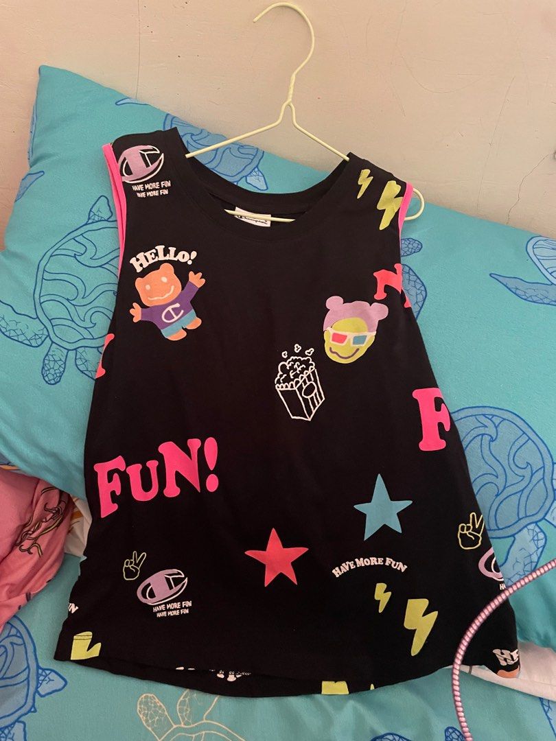 Champion Mussel Tee (Category: Babies & Kids Fashion) located in San Fernando. Submitted by yourdeclutterbuddy (Listing ID 1329122391, Image 1). Description: Size large on tag.